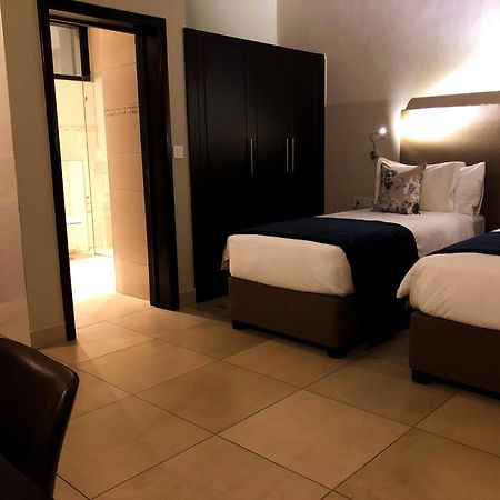 Mythos Boutique Hotel Кигали Номер фото