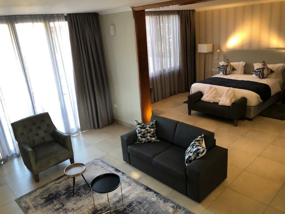 Mythos Boutique Hotel Кигали Экстерьер фото